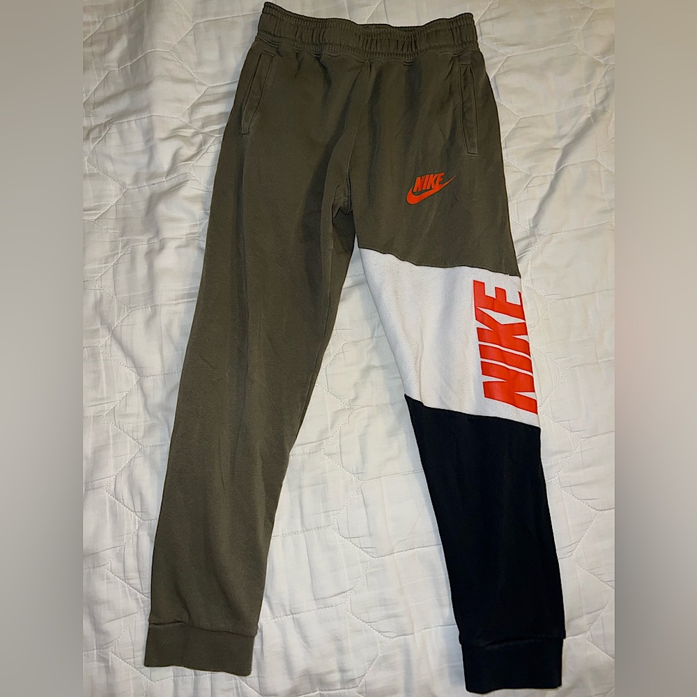 Army green Nike joggers